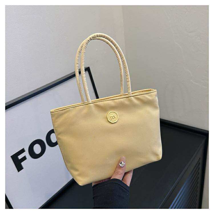 The Aqua Mini Bag
