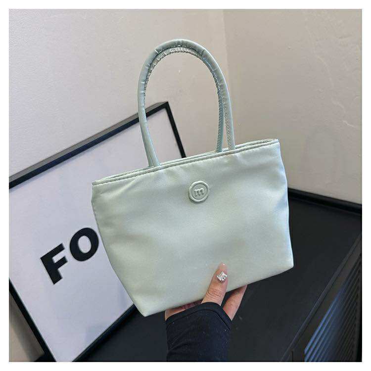 The Aqua Mini Bag