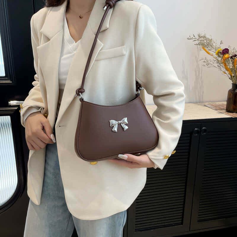 Silver Bow Knotted Strap Handbag