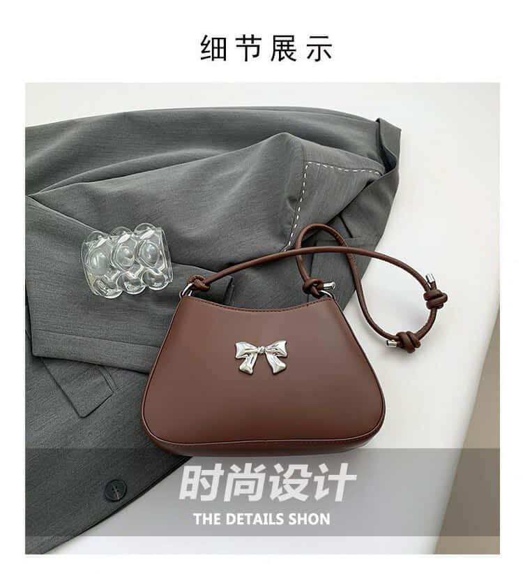 Silver Bow Knotted Strap Handbag