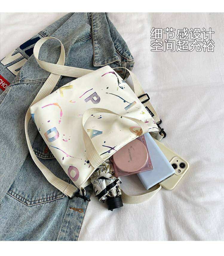 Lettered Lumina Bag